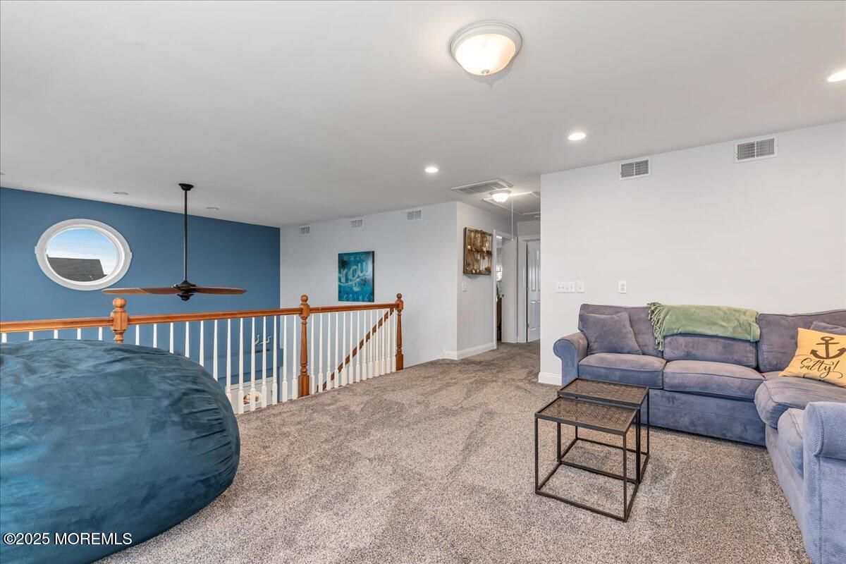 186 Flamingo Road Tuckerton, NJ 08087 - Photo 29 of 55 a living room with furniture and a window