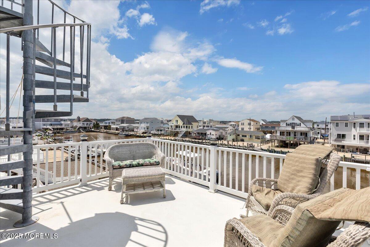 186 Flamingo Road Tuckerton, NJ 08087 - Photo 5 of 55 a view of a balcony with furniture