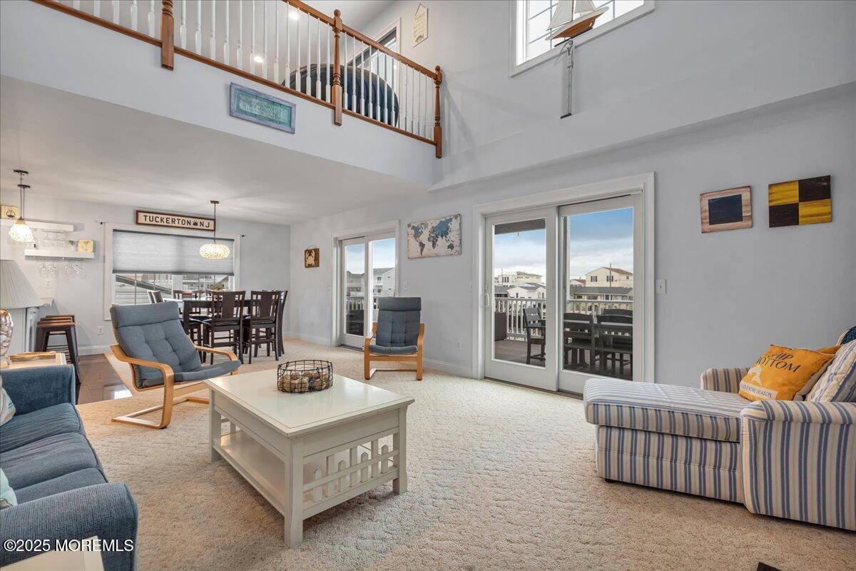 186 Flamingo Road Tuckerton, NJ 08087 - Photo 10 of 55 a living room with furniture and a table