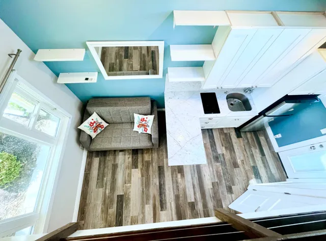 a view of living room with furniture and flat screen tv
