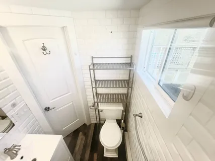 a bathroom with a toilet and a sink