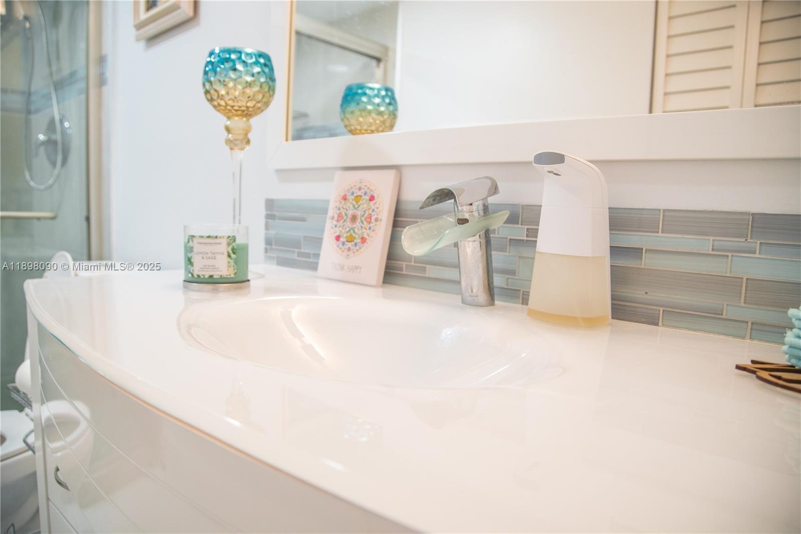 2304 Lucaya Lane, Unit J4 Coconut Creek, FL 33066 - Photo 48 of 50 a view of a bedroom with a bed and toys