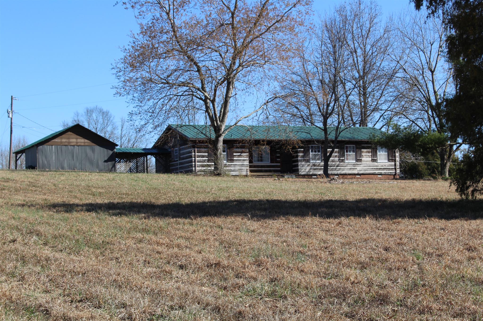 640 Pruett Road Dickson, TN 37055 - Photo 1 of 28 a front view of a house with a yard