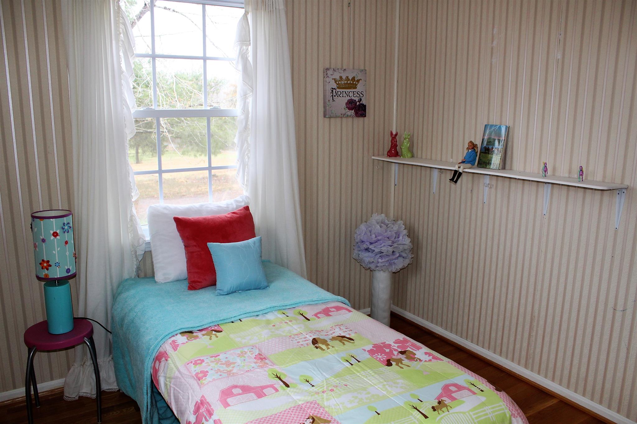 640 Pruett Road Dickson, TN 37055 - Photo 22 of 28 a bedroom with a bed and a window