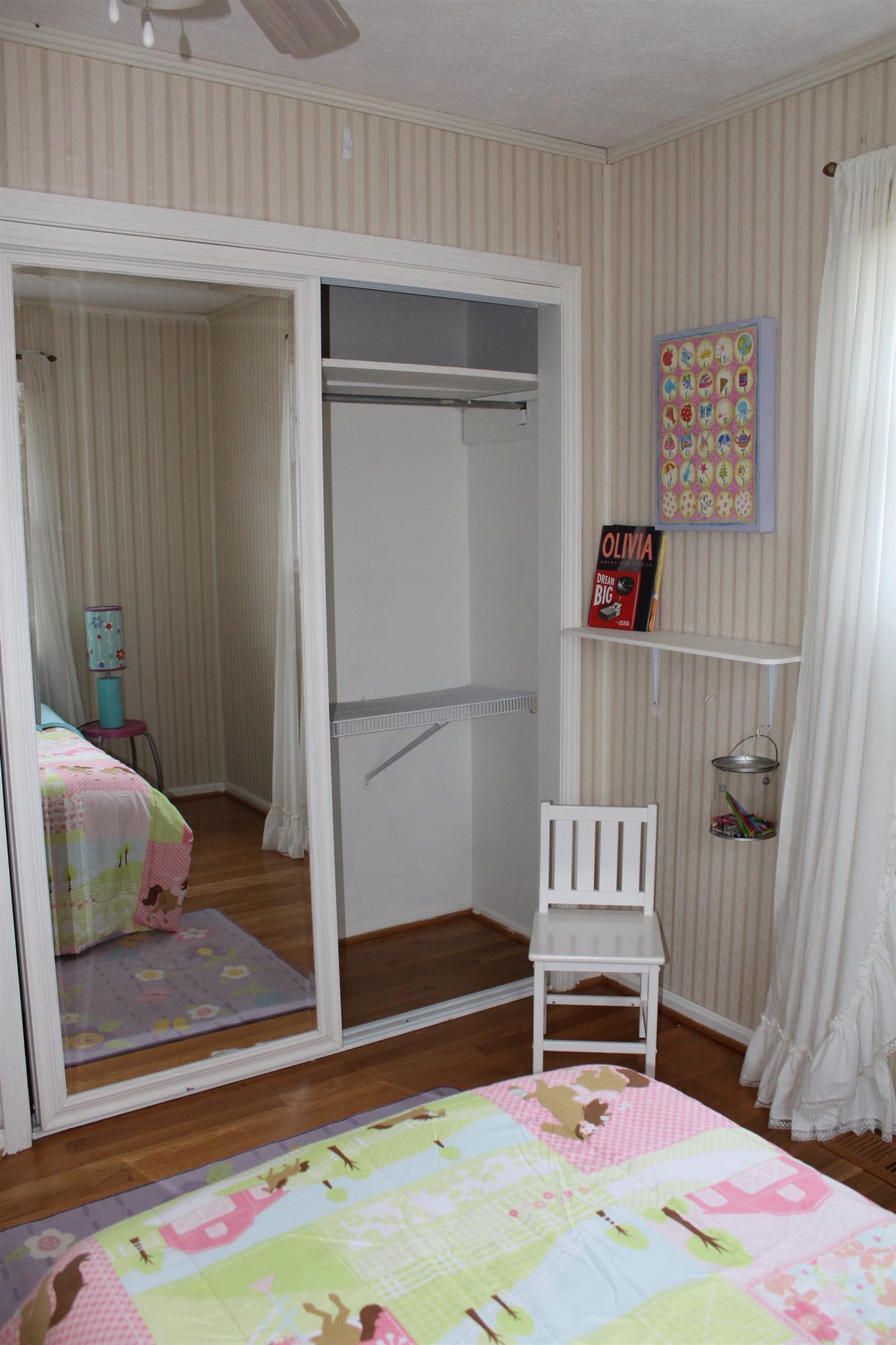 640 Pruett Road Dickson, TN 37055 - Photo 23 of 28 a room with toys and a wooden floor