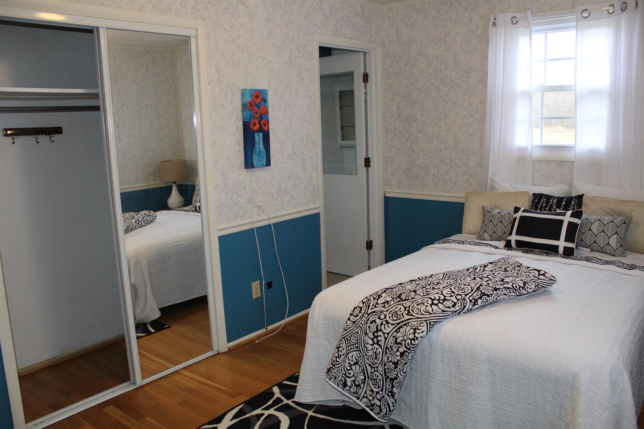 640 Pruett Road Dickson, TN 37055 - Photo 25 of 28 a bedroom with a bed and a window