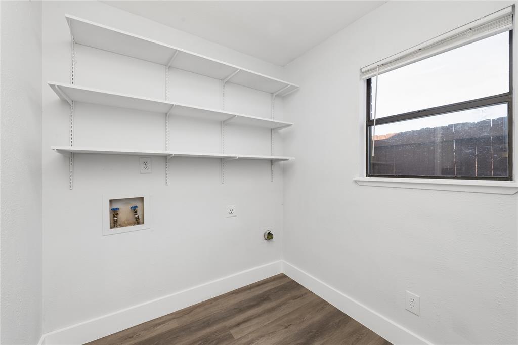 2119 Meadfoot Road Carrollton, TX 75007 - Photo 17 of 34 Laundry room featuring dark wood-style flooring, hookup for a washing machine, and hookup for an electric dryer