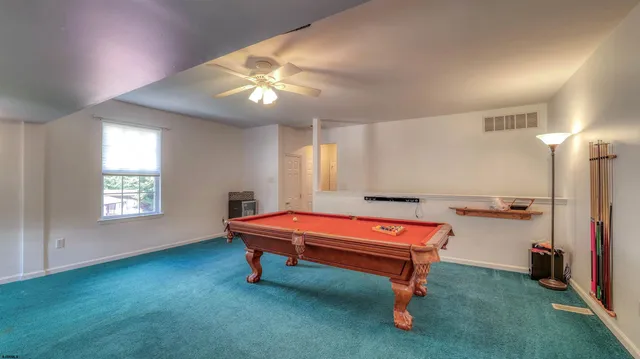 a roof deck view with wooden floor and fence
