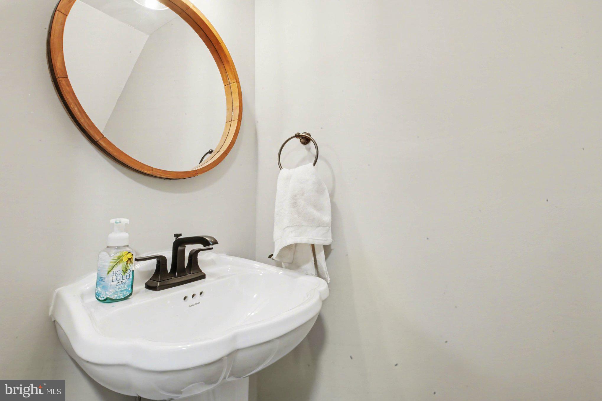 46 Morton Ridge Warrenton, VA 20186 - Photo 14 of 40 a bathroom with a sink and a mirror