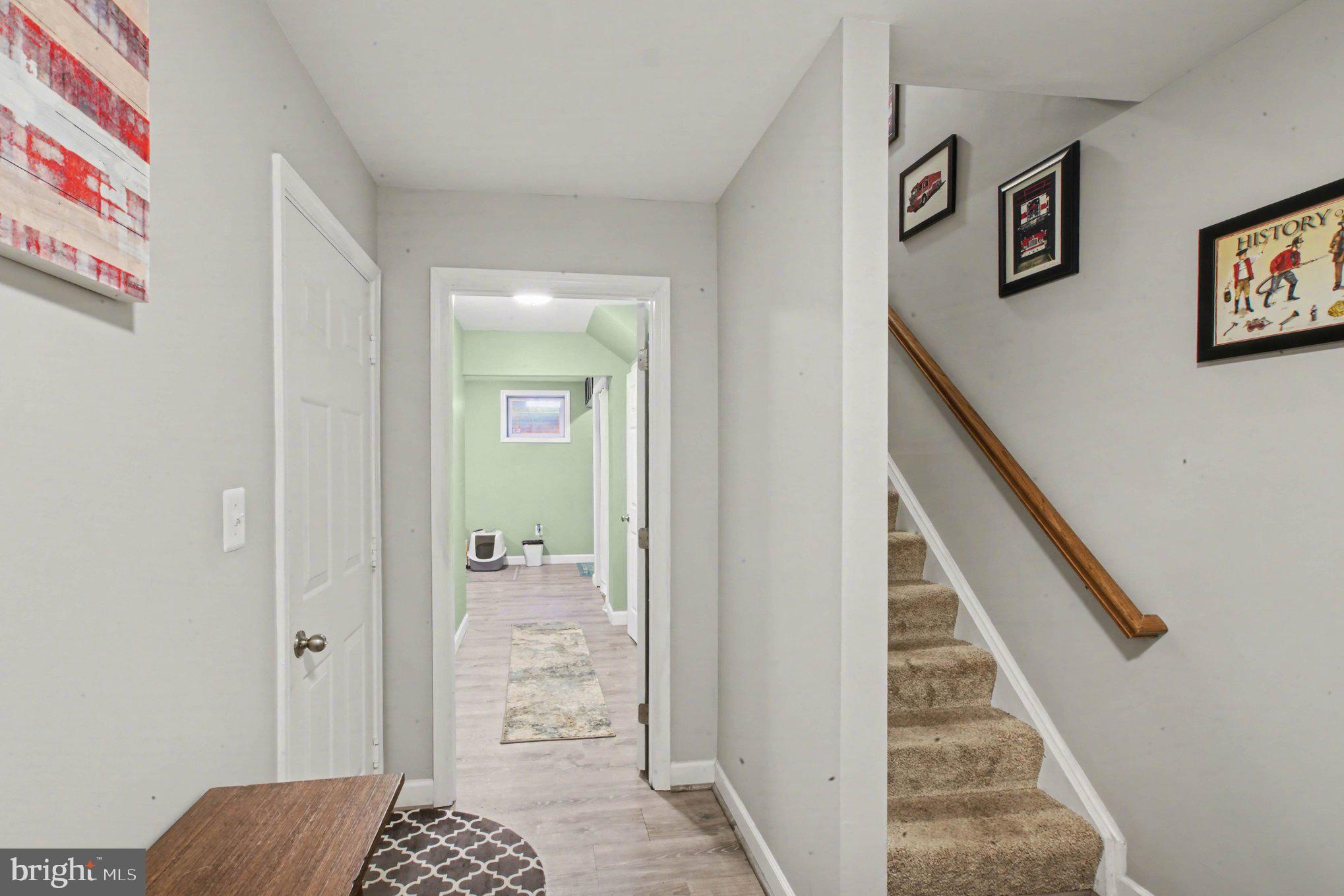 46 Morton Ridge Warrenton, VA 20186 - Photo 15 of 40 a view of a hallway with wooden floor and entryway
