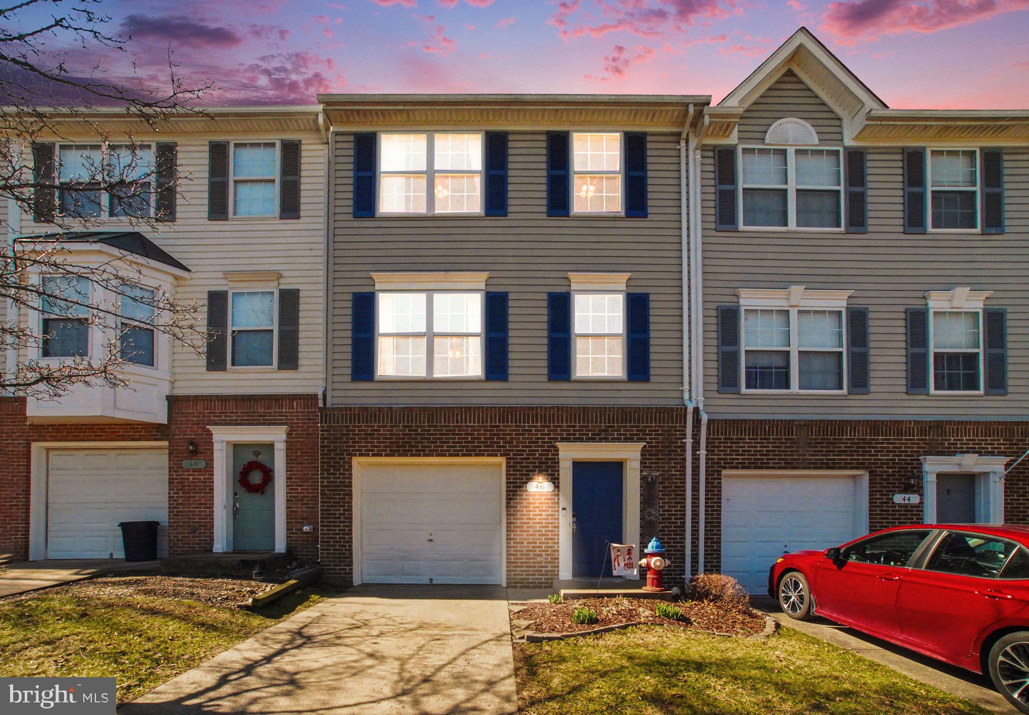 46 Morton Ridge Warrenton, VA 20186 - Photo 2 of 40 a view of a brick house with many windows