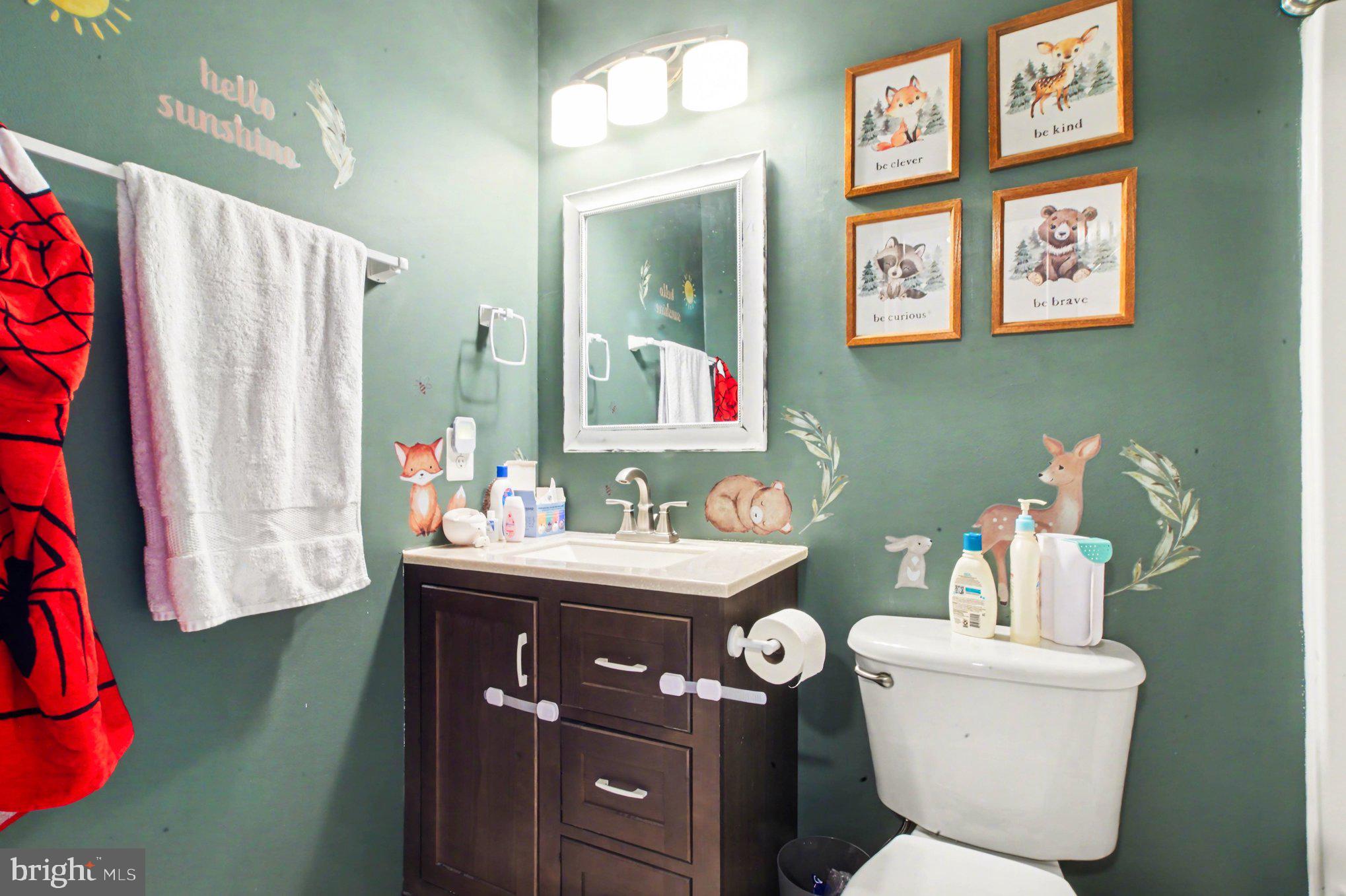 46 Morton Ridge Warrenton, VA 20186 - Photo 26 of 40 a bathroom with a toilet sink and mirror