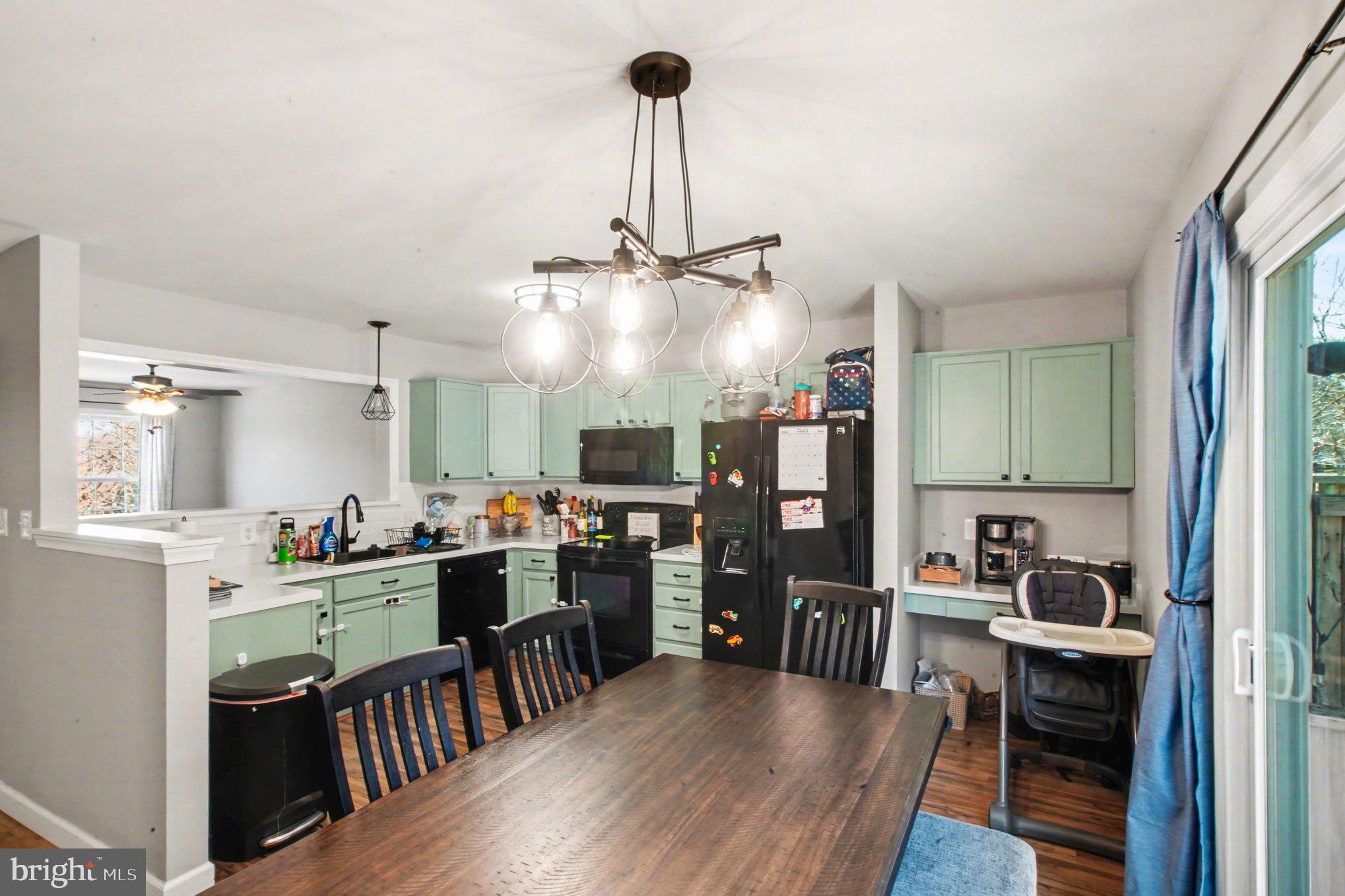 46 Morton Ridge Warrenton, VA 20186 - Photo 10 of 40 a kitchen with lots of counter top space appliances and furniture