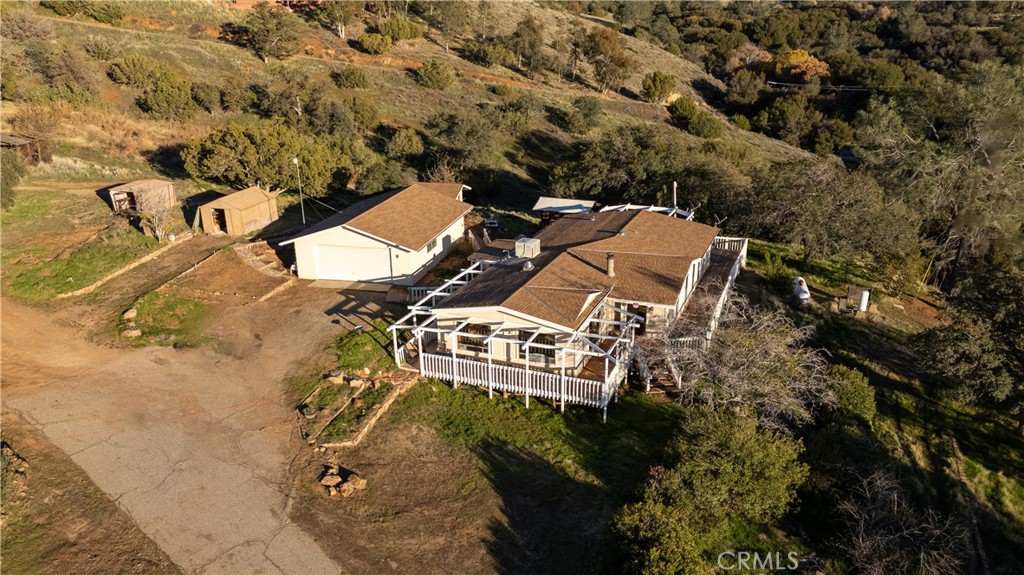967 Bodfish Canyon Road Bodfish, CA 93205 - Photo 3 of 16 an aerial view of a house with a yard and lake view