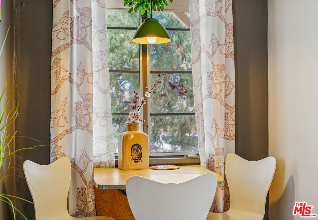 61855 Valley View Circle Joshua Tree, CA 92252 - Photo 18 of 59 a dining room with furniture and a window