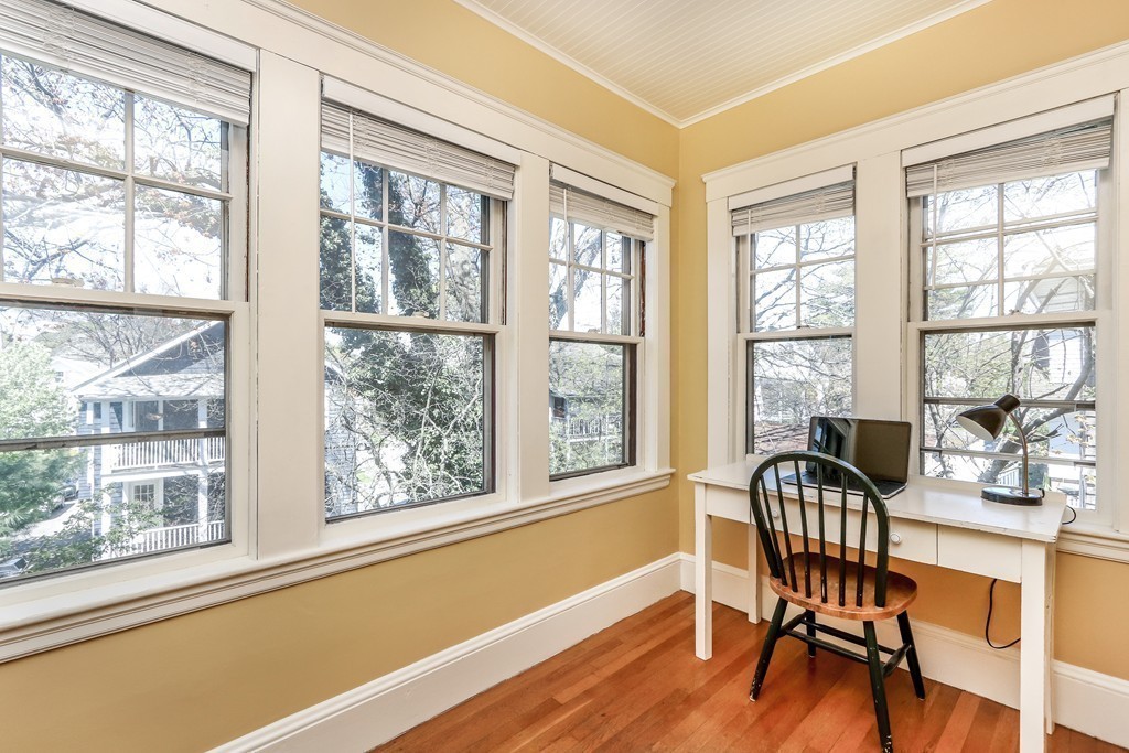 109 Adena Road, Unit 109 Newton, MA 02465 - Photo 17 of 23 a view of a dining room with furniture window and outside view