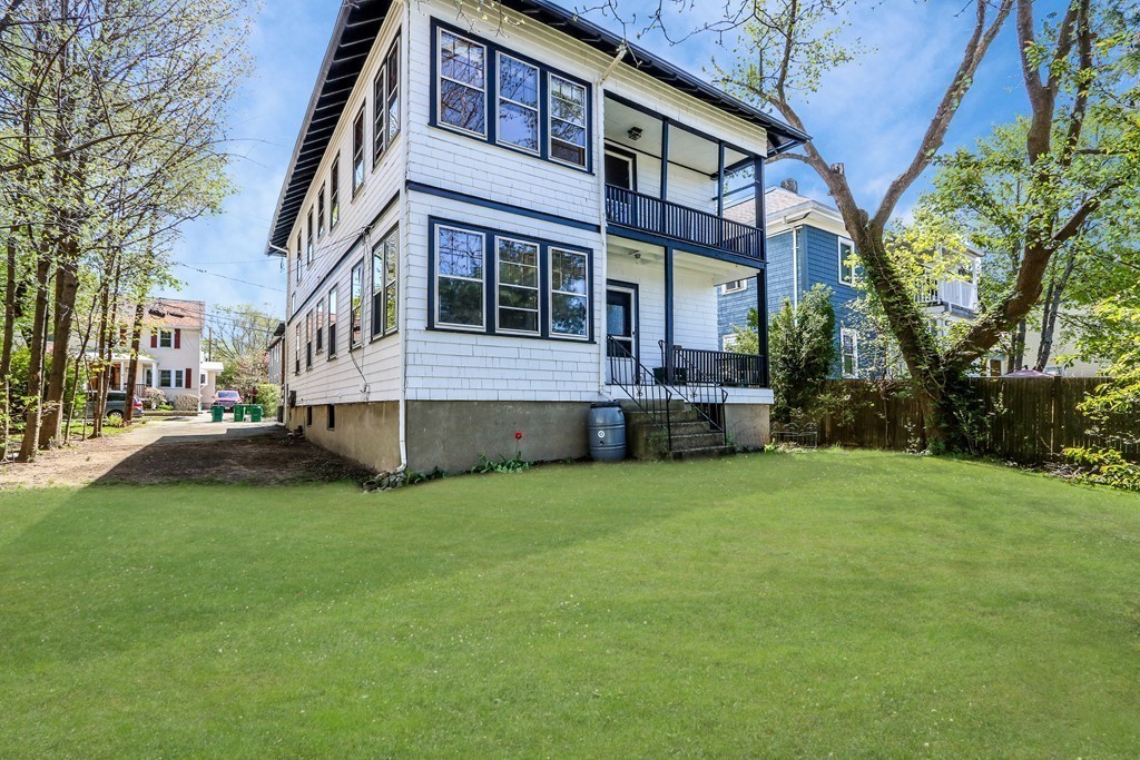109 Adena Road, Unit 109 Newton, MA 02465 - Photo 23 of 23 a view of a building with a yard