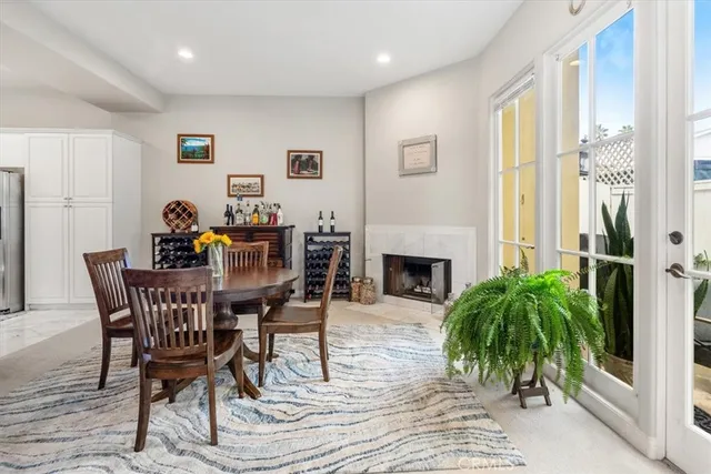 a dining room with furniture and windows