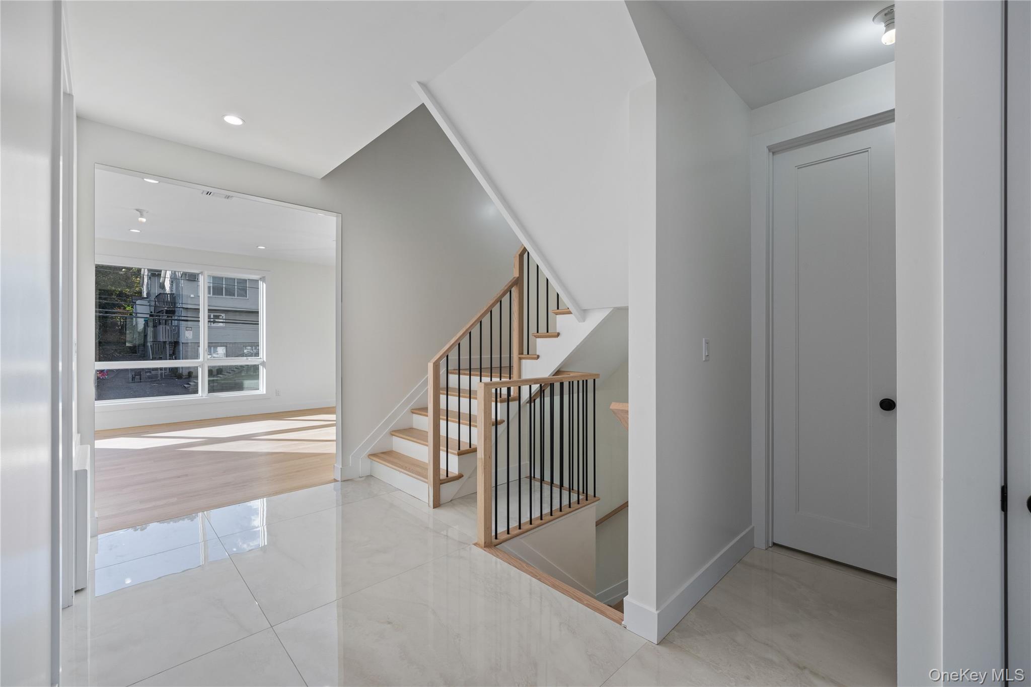 352 Blauvelt Road, Unit 203 Monsey, NY 10952 - Photo 14 of 33 a view of a hallway with windows and entryway