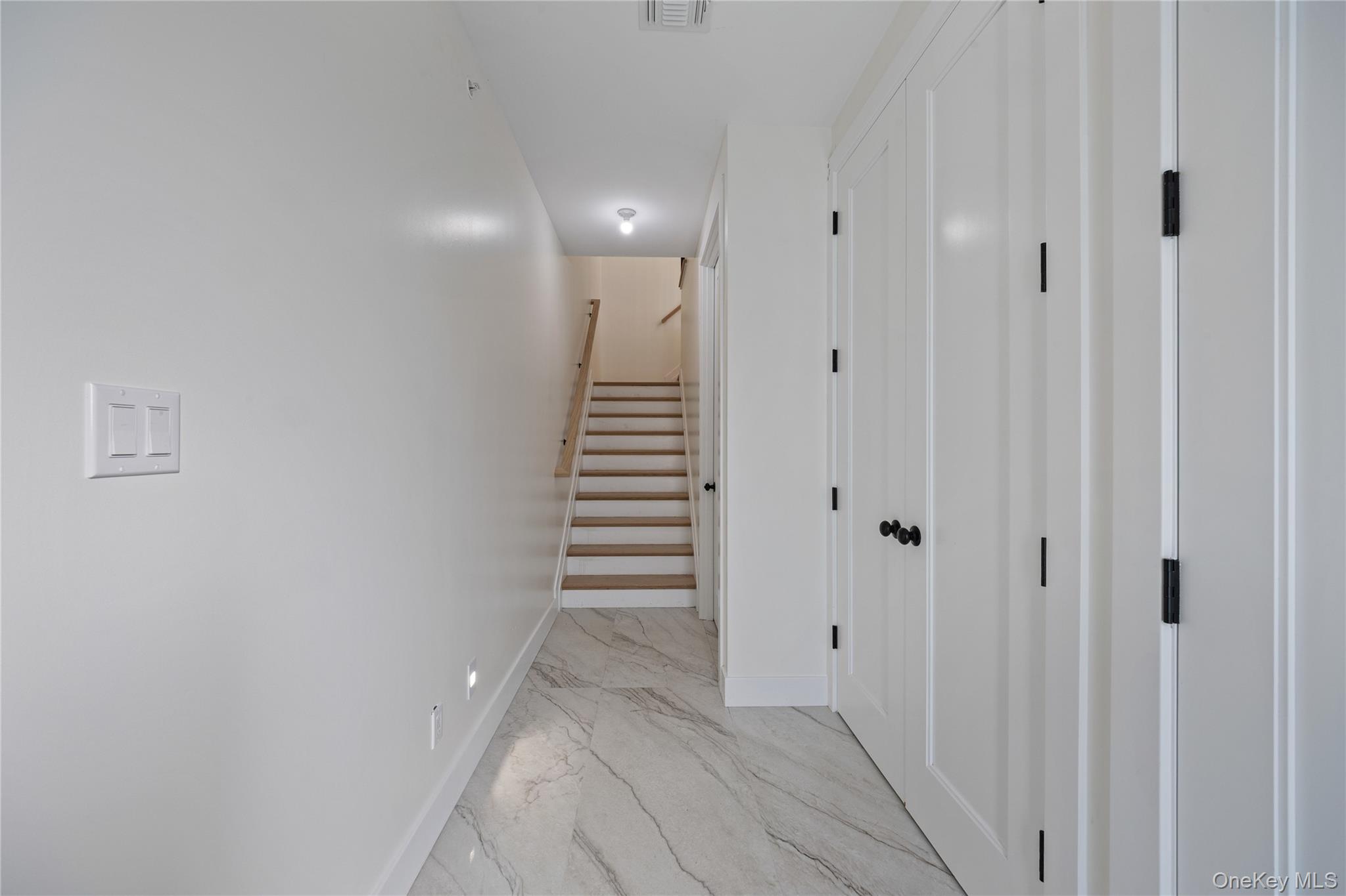 352 Blauvelt Road, Unit 203 Monsey, NY 10952 - Photo 2 of 33 a view of a hallway with stairs