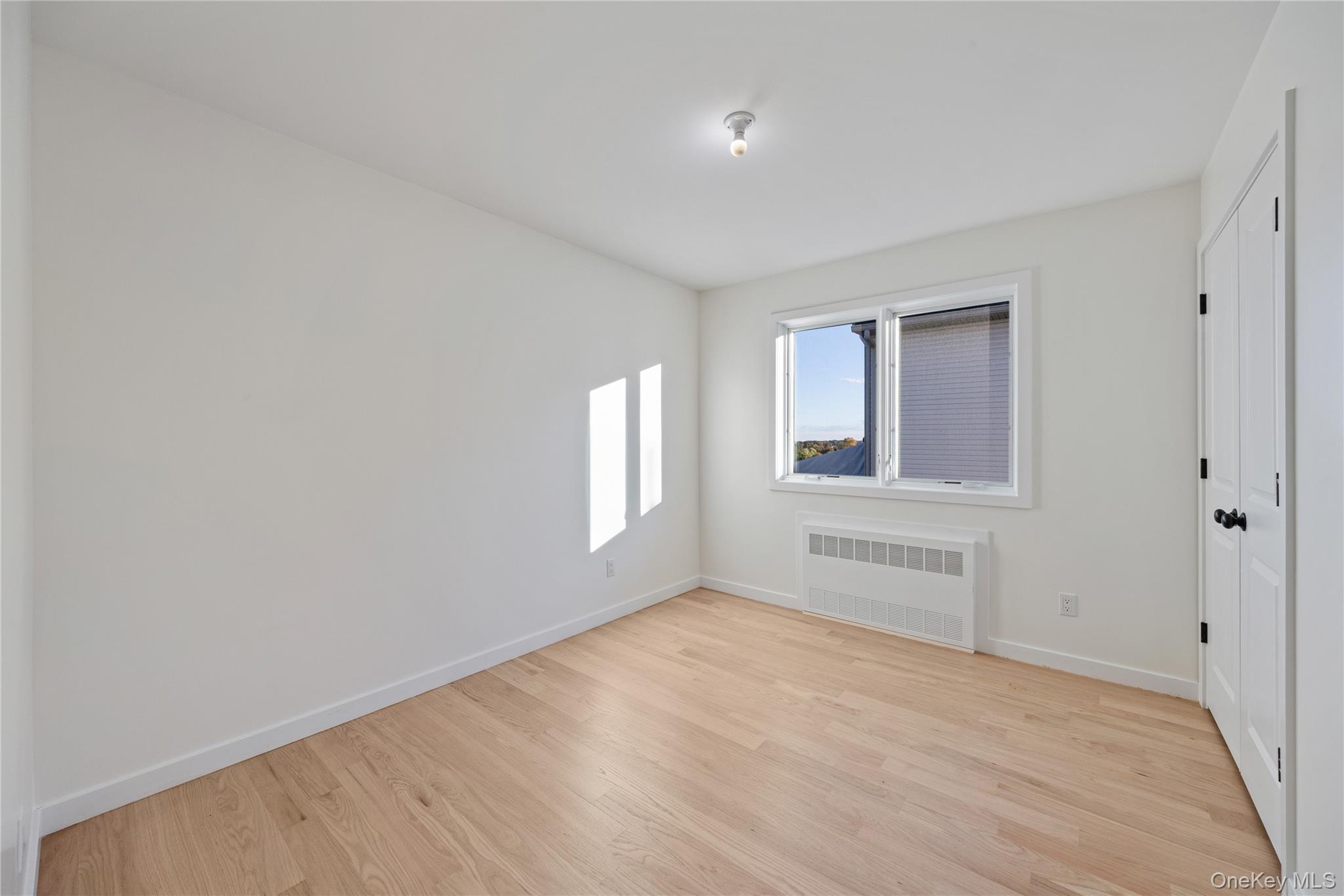 352 Blauvelt Road, Unit 203 Monsey, NY 10952 - Photo 22 of 33 a view of an empty room with a window