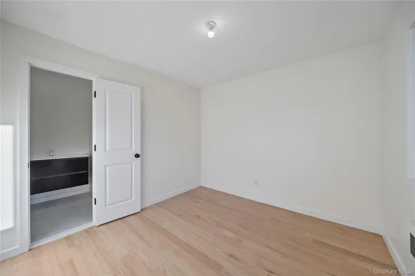 a bathroom with a toilet and bathtub