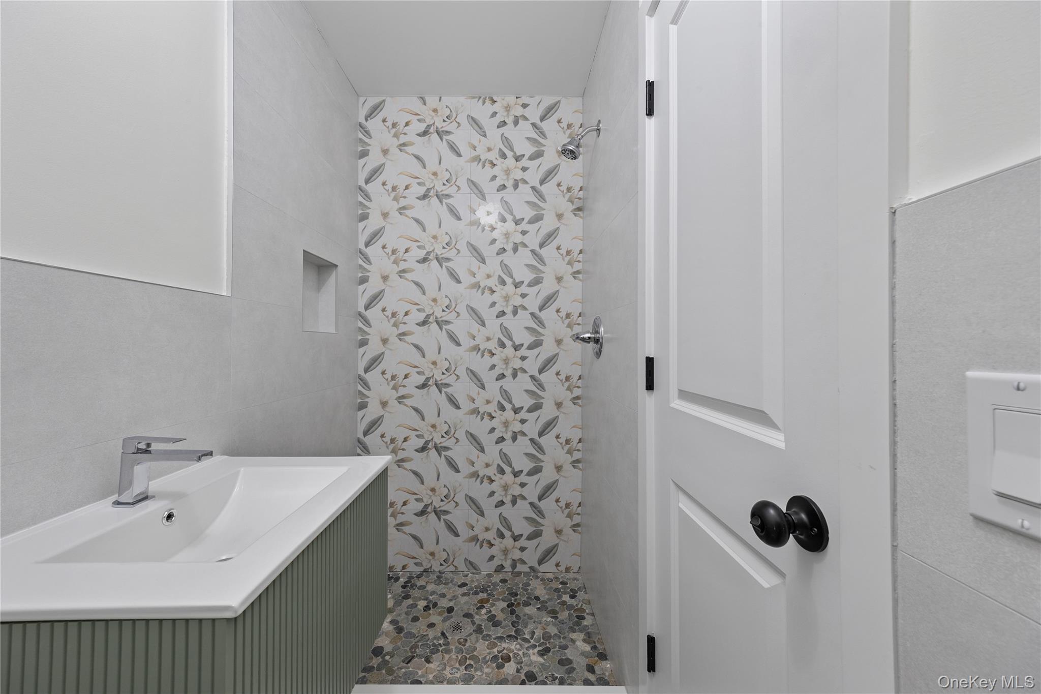 352 Blauvelt Road, Unit 203 Monsey, NY 10952 - Photo 30 of 33 a bathroom with a shower and a sink