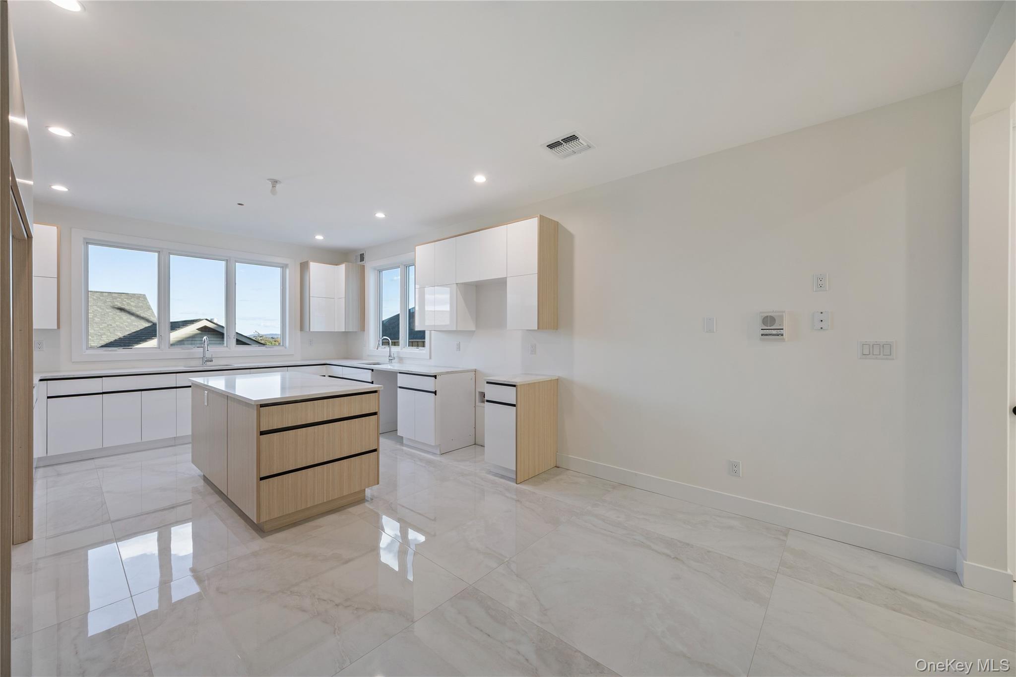 352 Blauvelt Road, Unit 203 Monsey, NY 10952 - Photo 8 of 33 a kitchen with a sink stainless steel appliances and cabinets