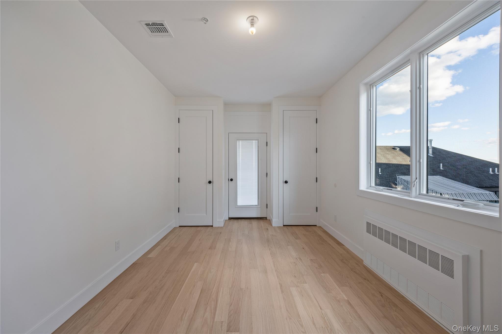 352 Blauvelt Road, Unit 203 Monsey, NY 10952 - Photo 10 of 33 a view of an empty room with a window