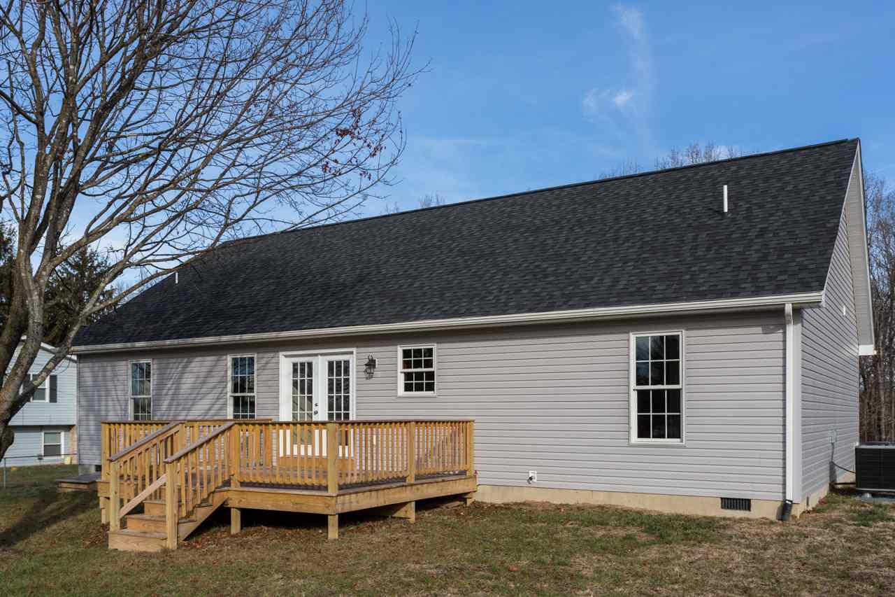 227 Harriston Road Grottoes, VA 24441 - Photo 20 of 25 a front view of a house with a yard