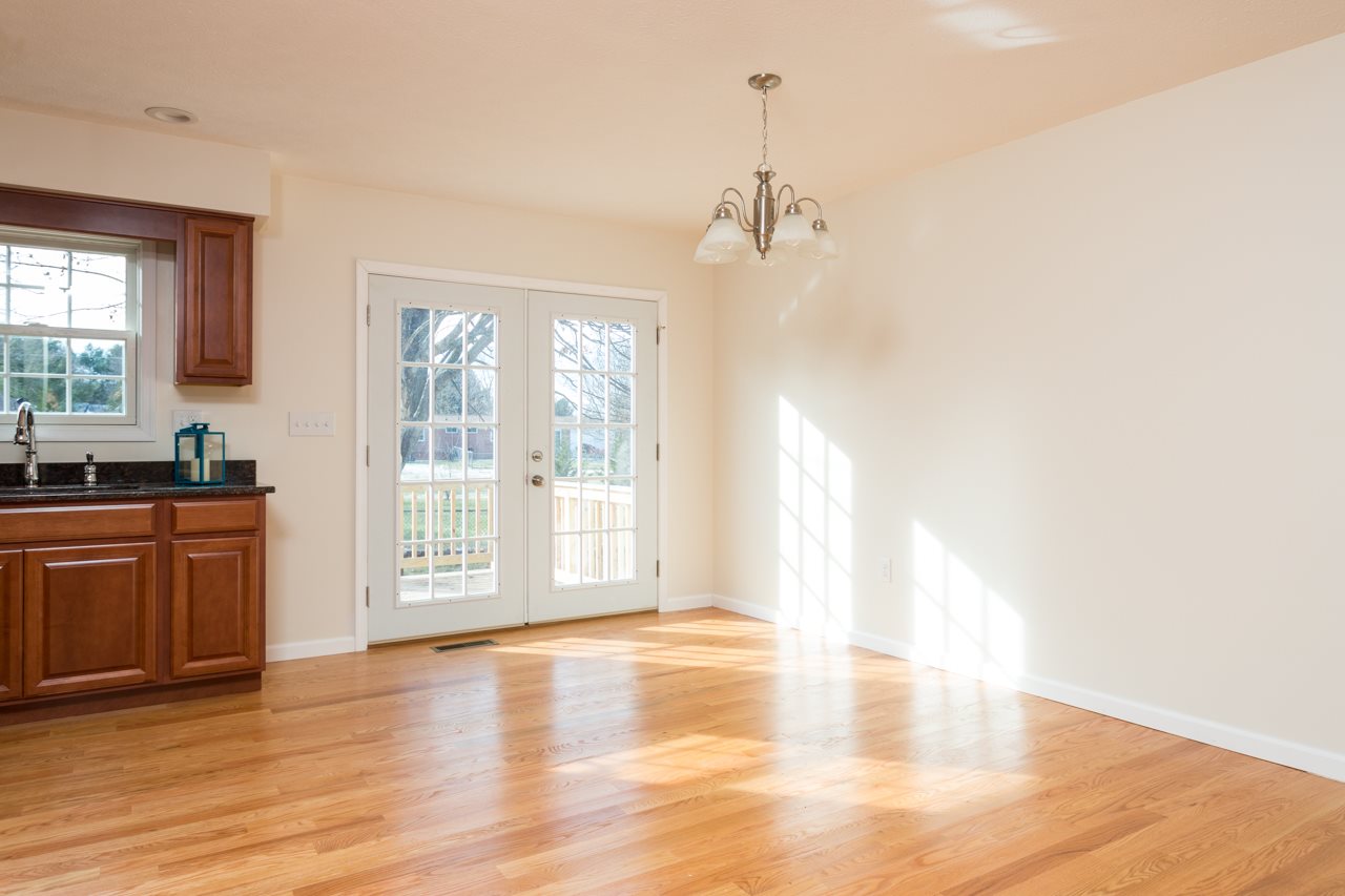 227 Harriston Road Grottoes, VA 24441 - Photo 4 of 25 a view of empty room with wooden floor and fan