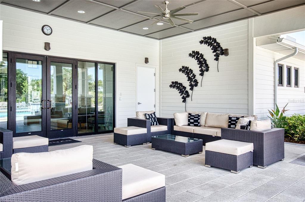 6736 Ripple Pond Loop Zephyrhills, FL 33541 - Photo 32 of 40 a living room with furniture and a large window
