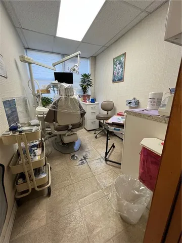 a view of a workspace with furniture