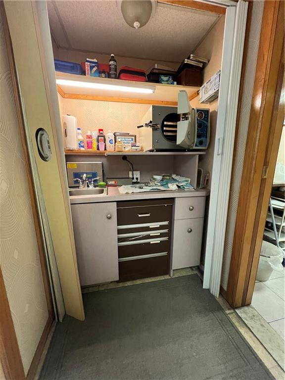 207 Ocean Parkway, Unit 1J Brooklyn, NY 11218 - Photo 3 of 11 a room with storage and utility