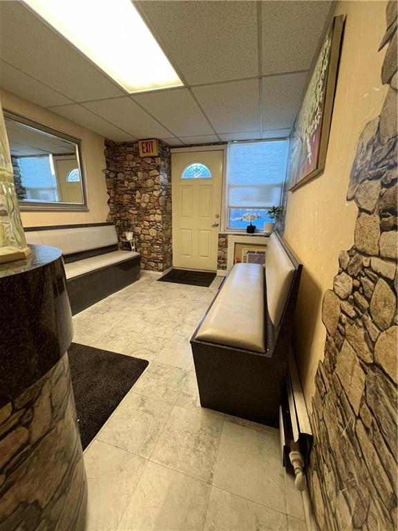 207 Ocean Parkway, Unit 1J Brooklyn, NY 11218 - Photo 6 of 11 a living room with furniture and a fireplace