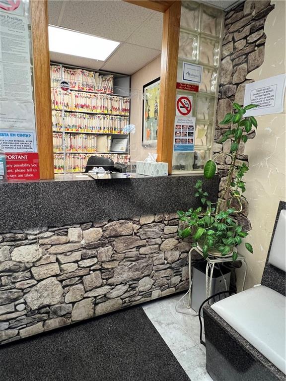 207 Ocean Parkway, Unit 1J Brooklyn, NY 11218 - Photo 9 of 11 a picture of a bench in front of building