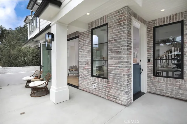 a view of a toilet with entryway