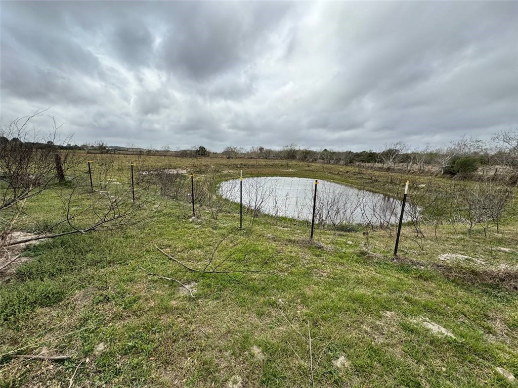 350 Quail Meadow Road Seadrift, TX 77983 - Photo 4 of 22 a view of a lake from a yard