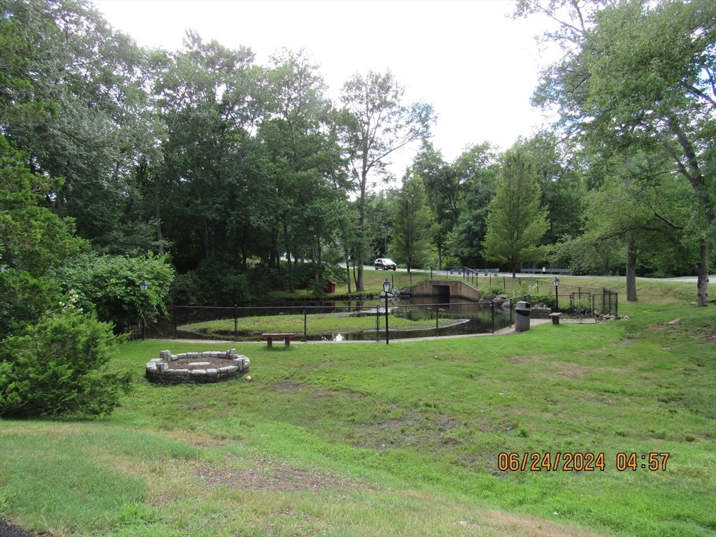 2 Shadowbrook Lane, Unit 50 Milford, MA 01757 - Photo 24 of 26 a view of a park with large trees