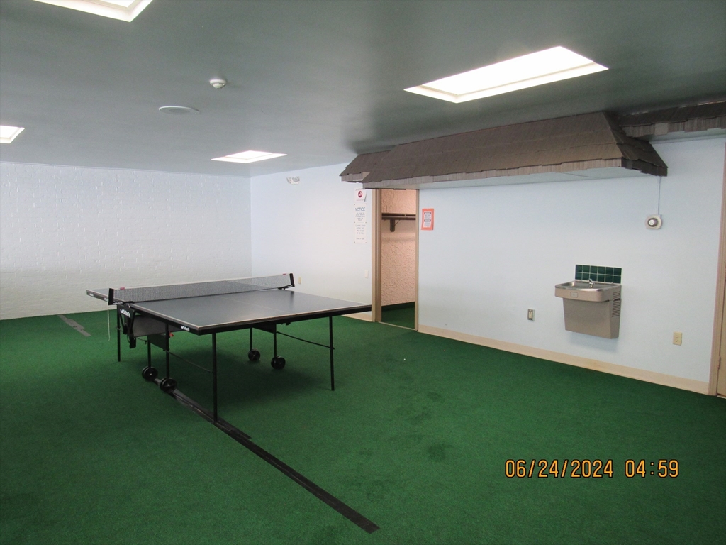 2 Shadowbrook Lane, Unit 50 Milford, MA 01757 - Photo 26 of 26 a view of a room with shelves