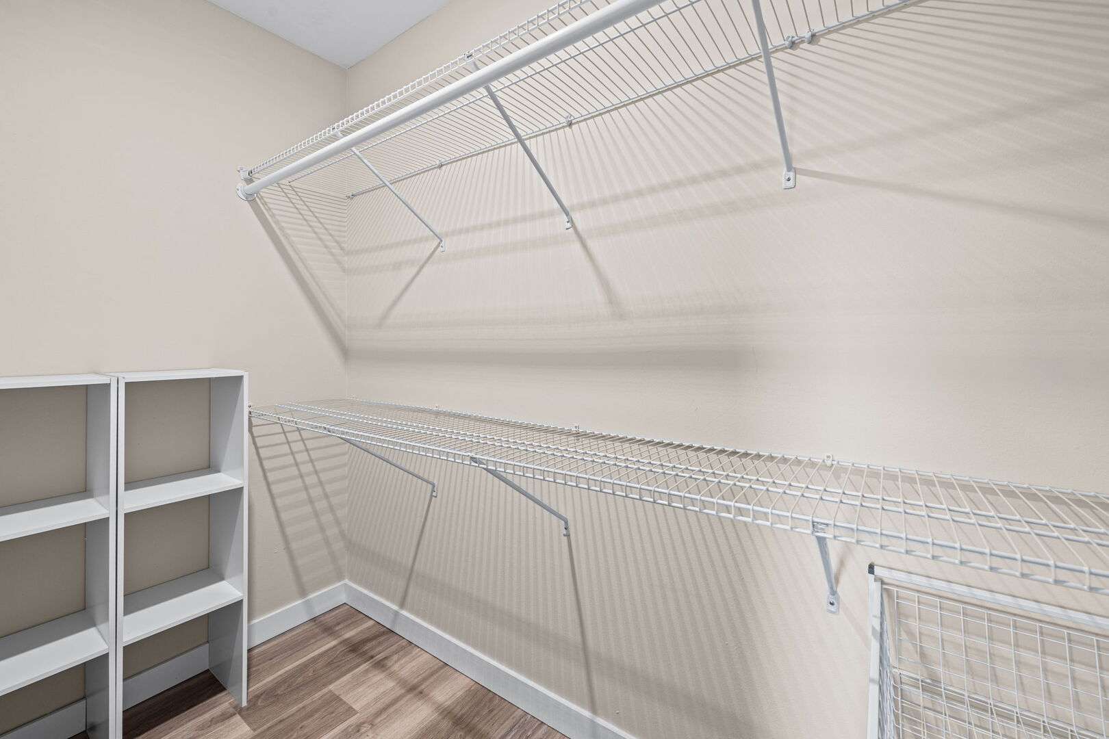 1205 East Hintz Road, Unit 209 Arlington Heights, IL 60004 - Photo 18 of 27 a view of a room with racks on the wall