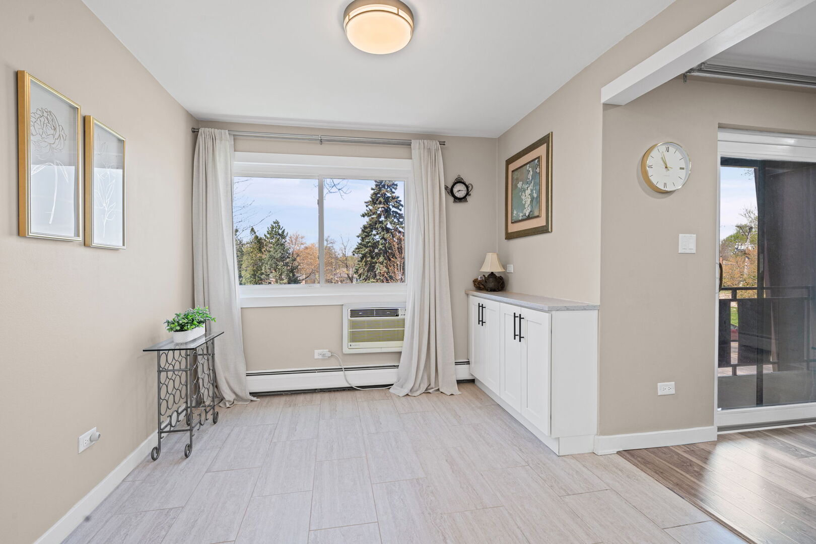 1205 East Hintz Road, Unit 209 Arlington Heights, IL 60004 - Photo 6 of 27 a workspace with furniture and window
