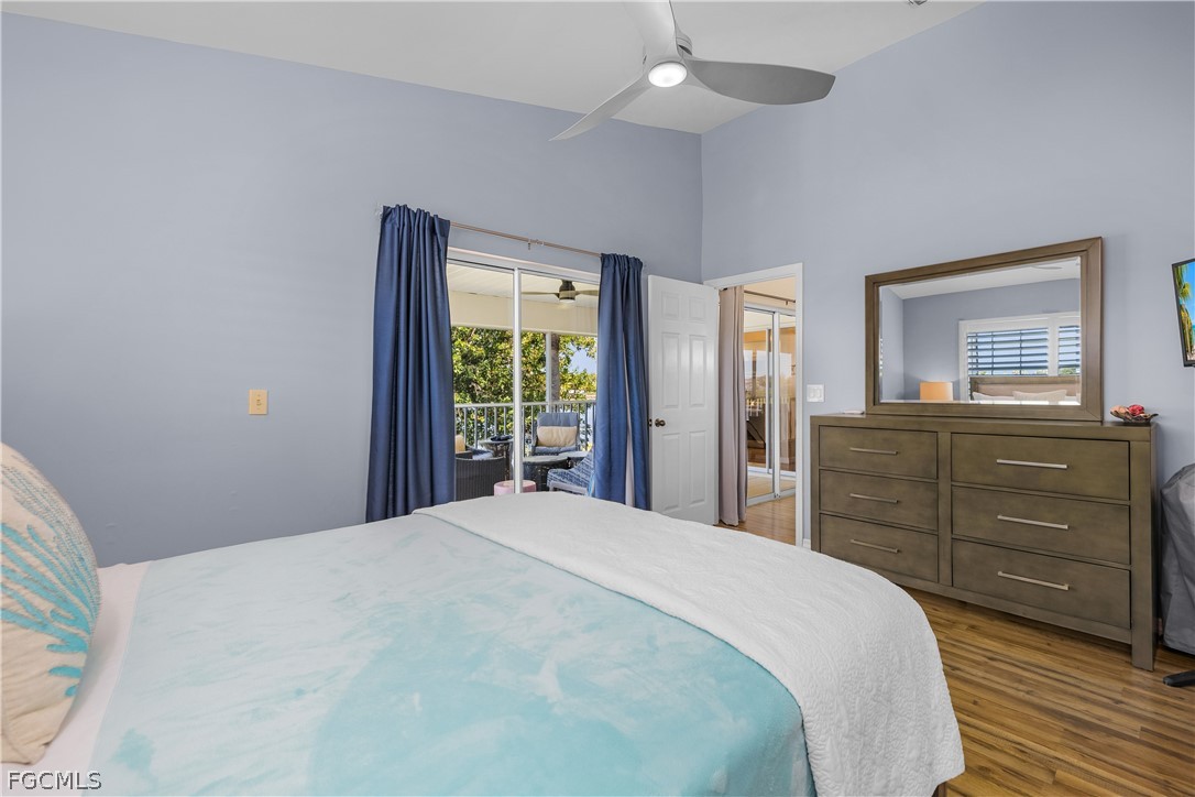 14983 Rivers Edge Court, Unit 232 Fort Myers, FL 33908 - Photo 13 of 27 a bedroom with a bed and a dresser