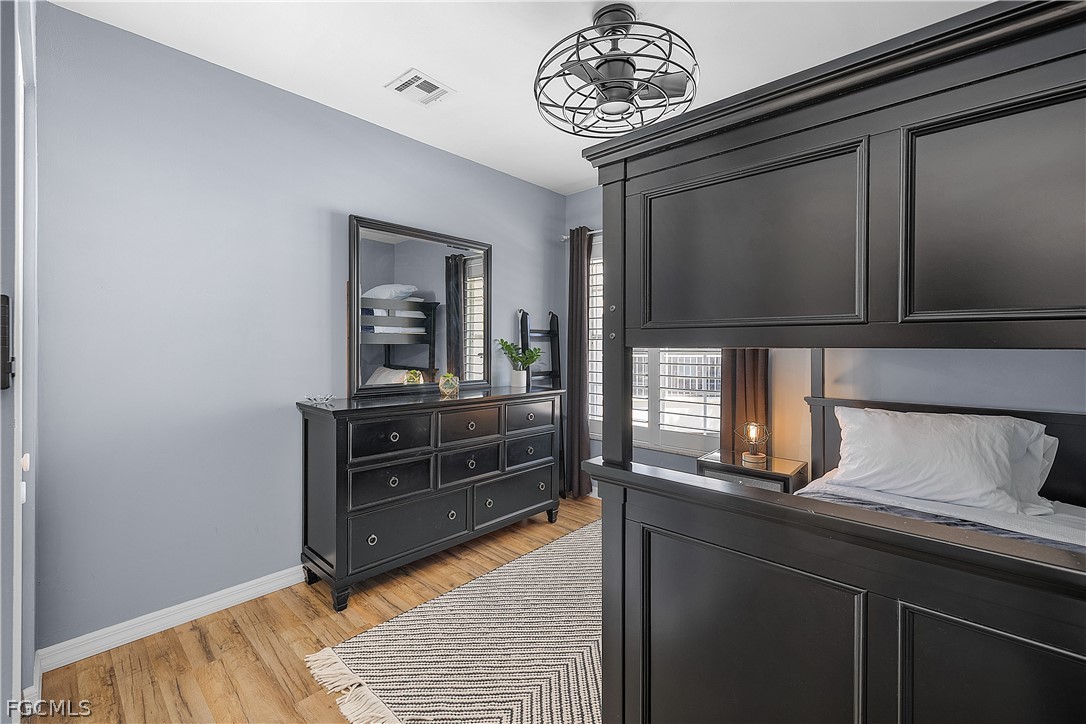 14983 Rivers Edge Court, Unit 232 Fort Myers, FL 33908 - Photo 16 of 27 a view of a hallway to a livingroom with furniture