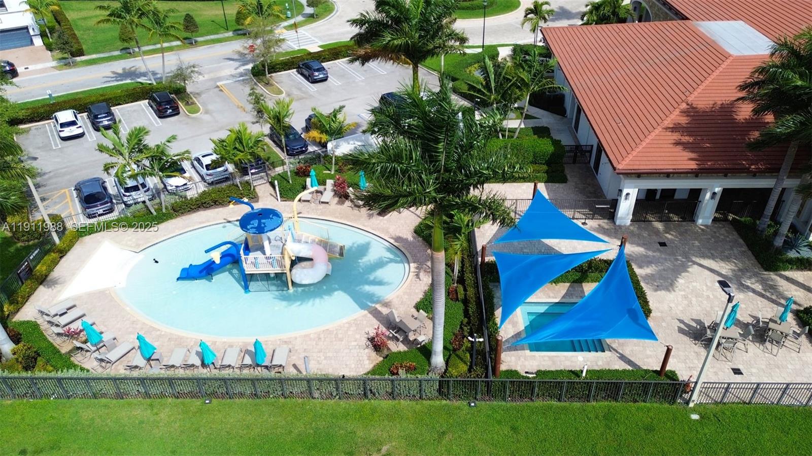 10583 West 35th Way, Unit 10583 Hialeah, FL 33018 - Photo 14 of 48 an aerial view of a house outdoor space and swimming pool
