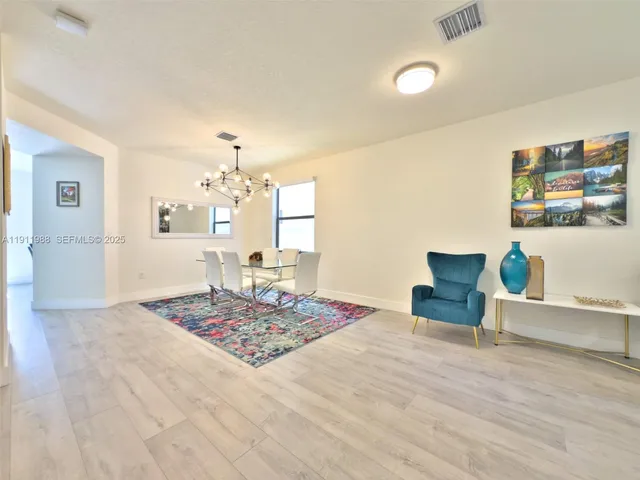 a bedroom with furniture and a table