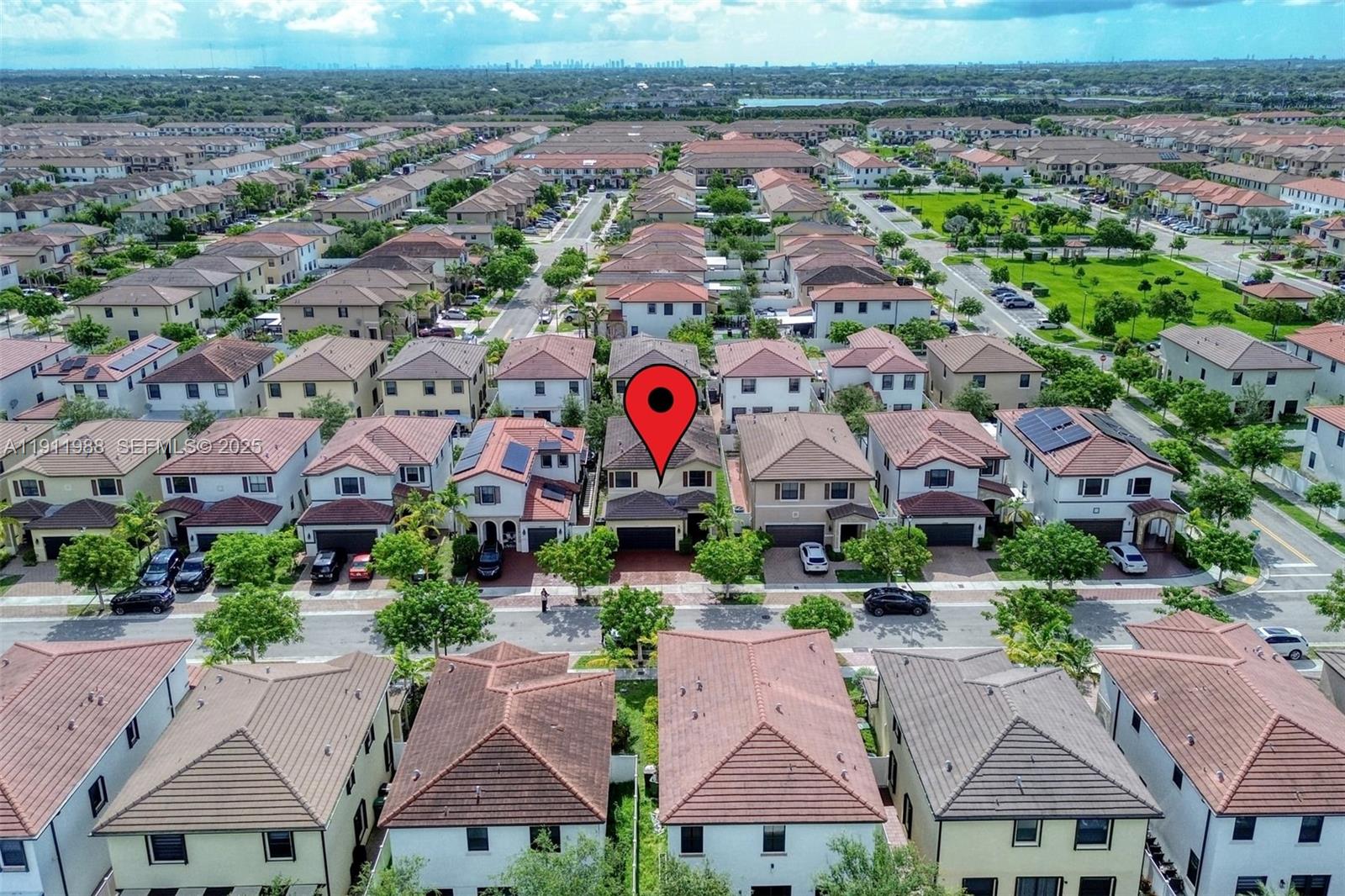 10583 West 35th Way, Unit 10583 Hialeah, FL 33018 - Photo 2 of 48 an aerial view of house with yard and ocean view