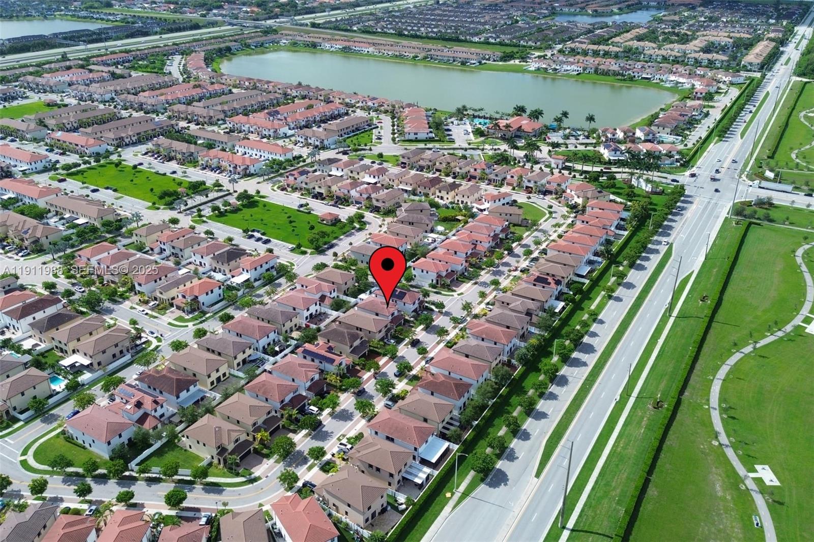 10583 West 35th Way, Unit 10583 Hialeah, FL 33018 - Photo 3 of 48 a view of a lake with a city