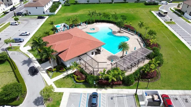 an aerial view of a house with outdoor space