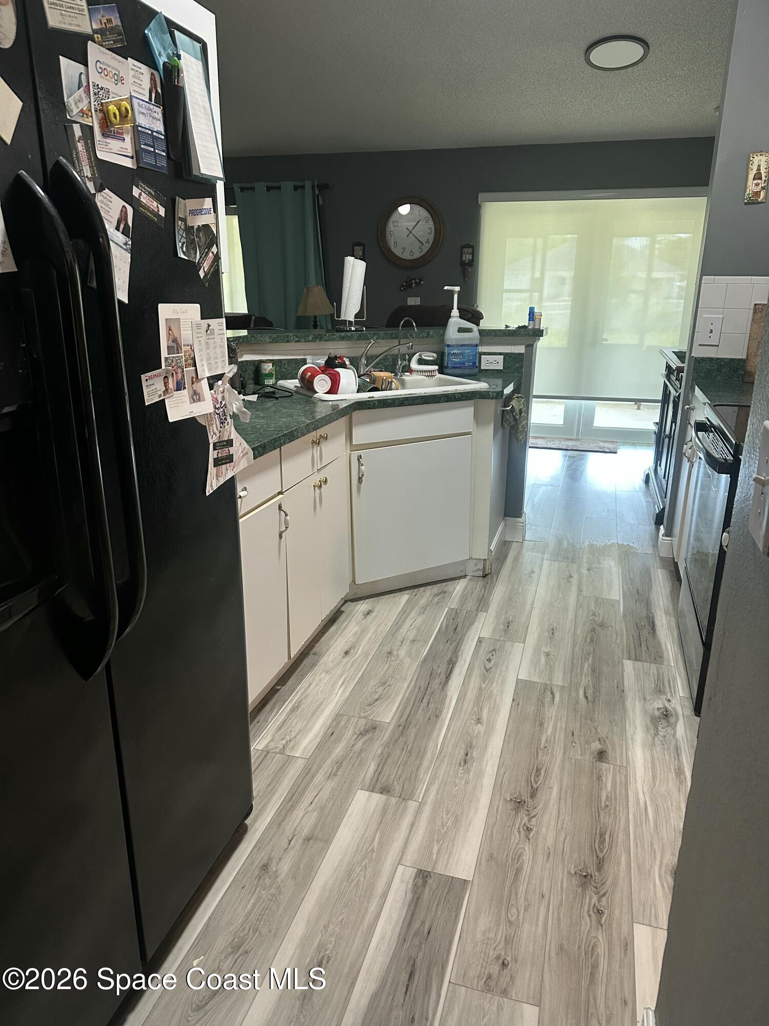 2190 Thames Road Southeast Palm Bay, FL 32909 - Photo 4 of 7 Kitchen pass through